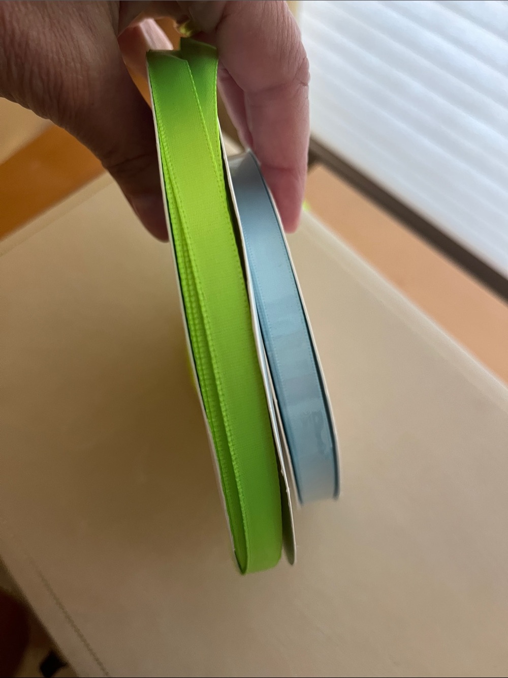 Neon Green and Pale Blue Satin Ribbon Rolls